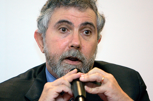 Nobel Prize-winning economist Paul Krugman speaks during a press conference at the World Capital Markets Symposium in Kuala Lumpur, Malaysia, Monday, Aug. 10, 2009. Aggressive stimulus spending by governments helped the world avoid a second Great Depression but full economic recovery will take two years or more, Krugman said Monday. (AP Photo/Lai Seng Sin)